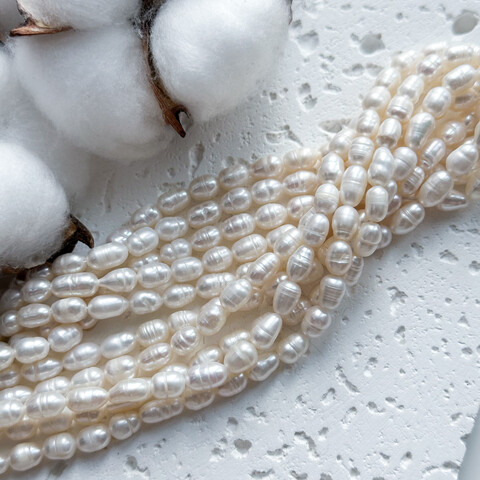 Жемчуг натуральный 5-6 мм овальный