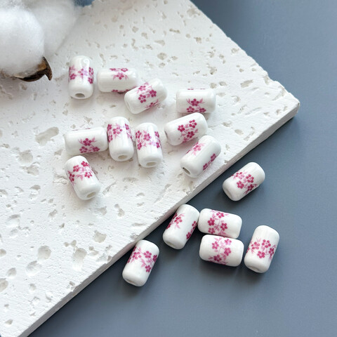 Бусина цилиндрическая с цветком керамика 10х17 мм розовый (1 шт.)